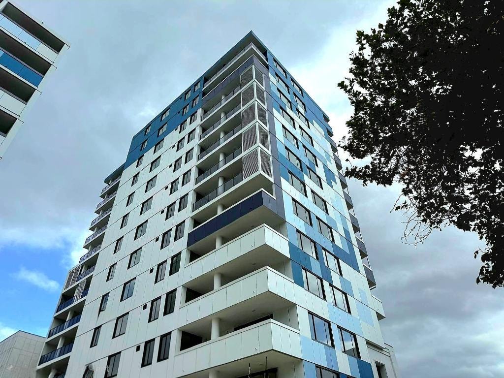 The Crescent Fairfield — upper façade blue panels